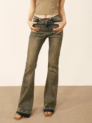 Distressed flared jeans