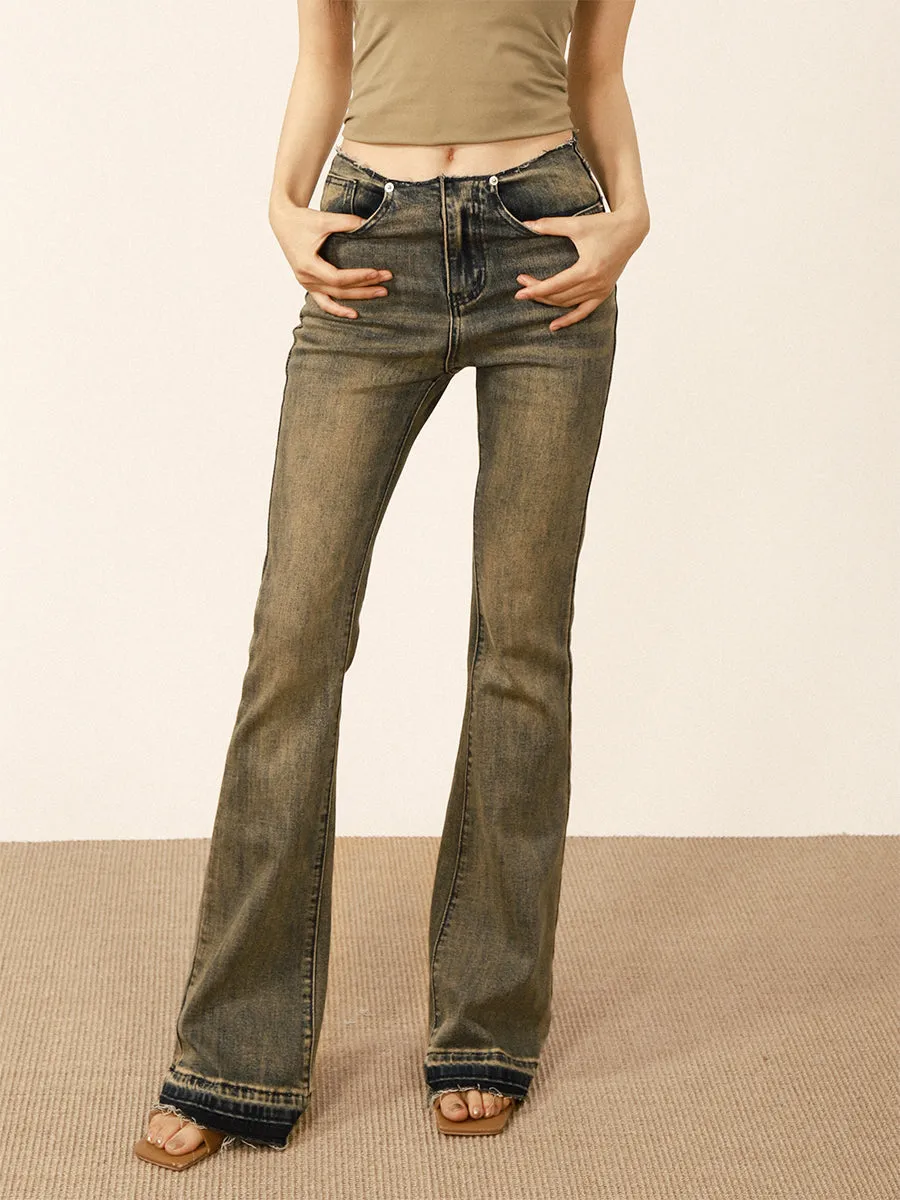 Distressed flared jeans
