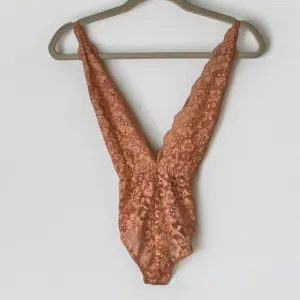 We Are HAH Comin in Haht Lace one-piece bodysuit Sz XS in Pink Nude color
